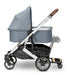caption-Accessorize your UPPAbaby Cruz V2 Stroller - Shown with UPPAbaby Bassinet in Gregory and Piggyback Ride-on Board