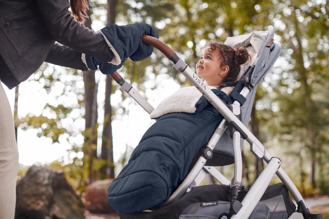 caption-Child blanketed in Cozy Ganoosh on UPPAbaby stroller
