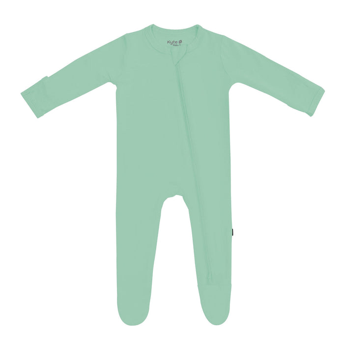 caption-Wasabi Green Footed Sleeper by Kyte Baby