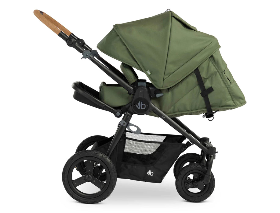 Side profile of Bumbleride Era in infant recline with leg rest and seat padding brought up and snapped in. Canopy is fully extended.  Bumbleride Era is newborn ready. Optional organic cotton infant insert sold separately