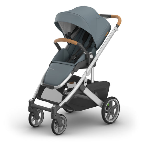 UPPAbaby Cruz V3 Stroller with brown handles on a white background