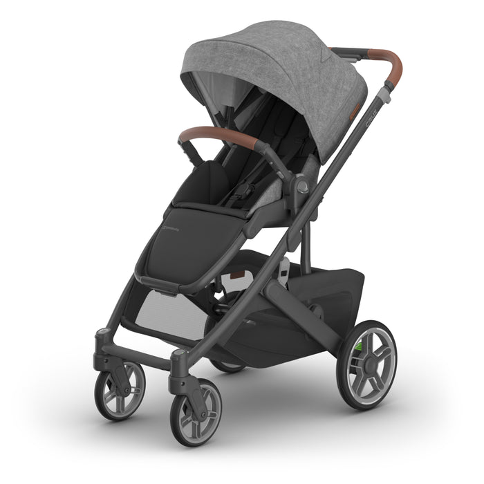 UPPAbaby Cruz V3 Stroller grey stroller with brown leather handlebar on a white background
