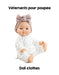 Doll wearing a white outfit with a bow on a white background