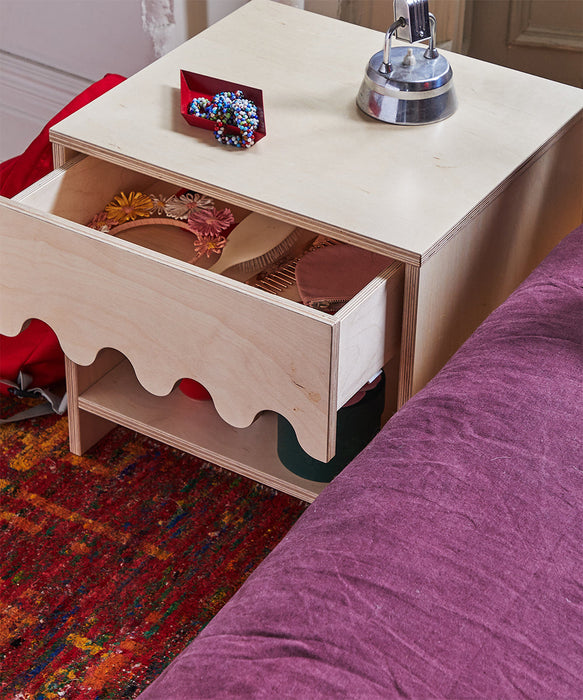 caption-Features a drawer for discreet storage