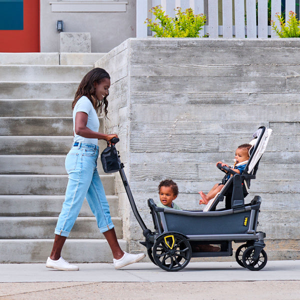 caption-Family uses Veer Cruiser City with additional Switchback Seat (sold separately)