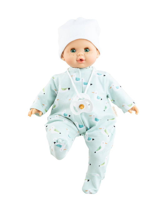 Baby doll wearing a light blue outfit with patterns on a white background