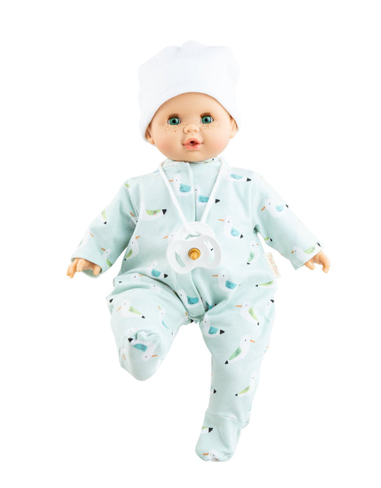 Baby doll wearing a light blue outfit with patterns on a white background