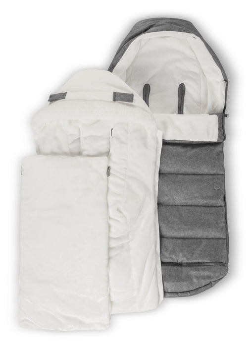 Gray and white stroller ganoosh layers with soft texture on a white background