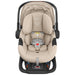 Beige UppaBaby Aria V2 infant only car seat with black frame on a white background