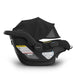 Black baby car seat with canopy on a white background