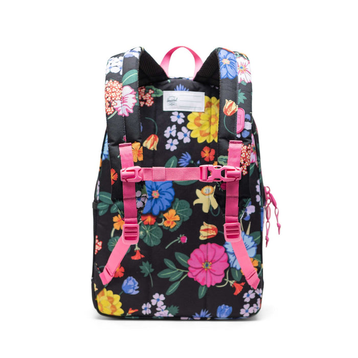Floral-patterned backpack with pink straps on a white background