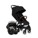 Black baby stroller with black carseat on white background
