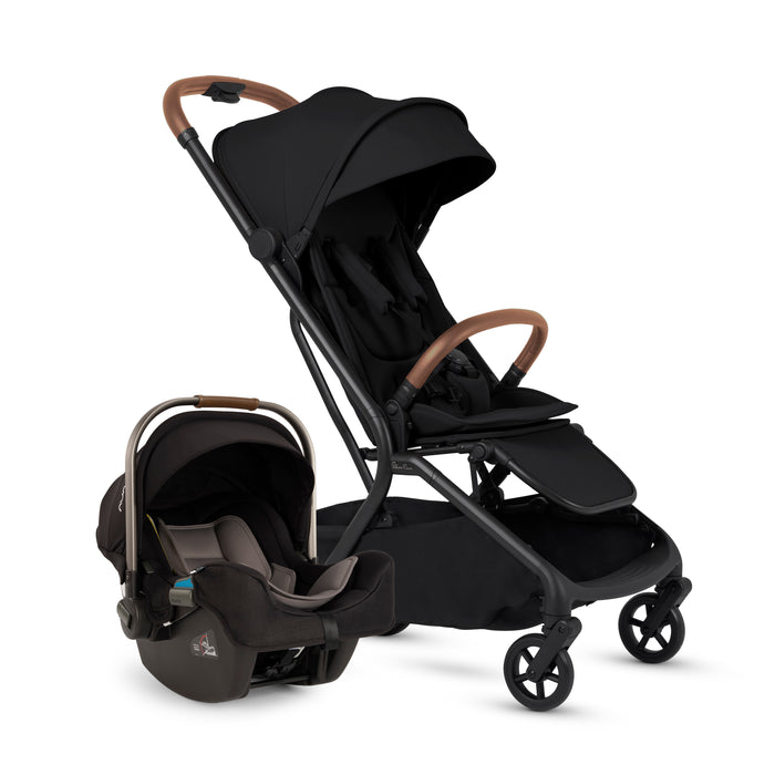Black stroller with baby seat on a white background