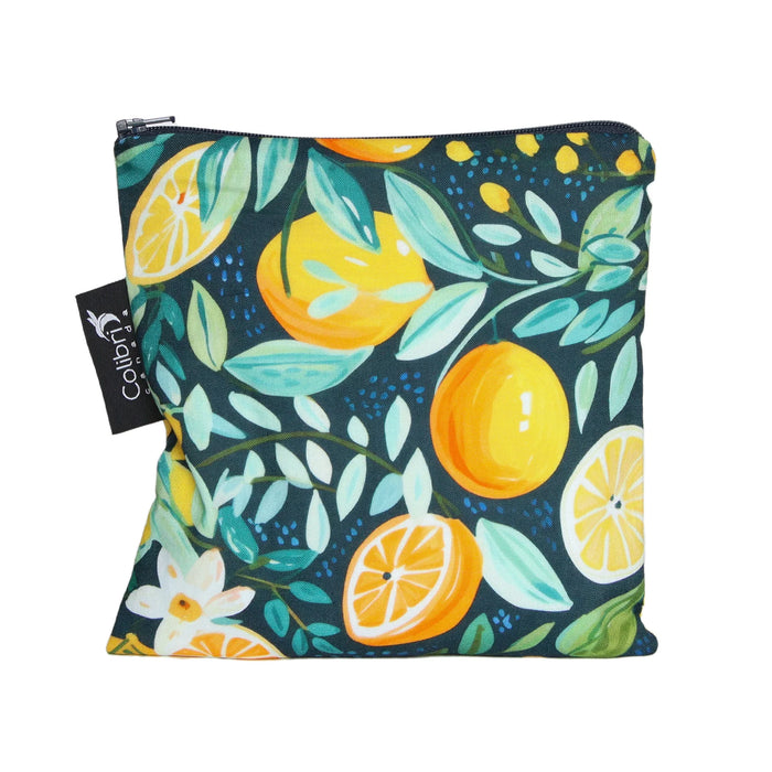 Pouch with lemon and leaf pattern on a dark background, featuring the brand Colibri