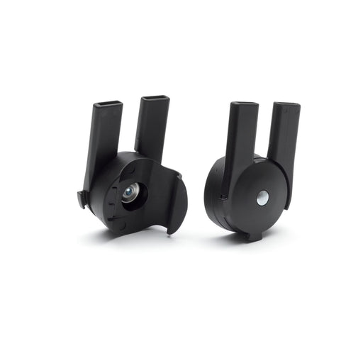 Two black mechanical components on a white background
