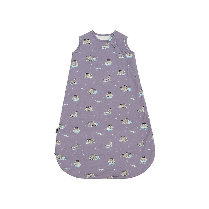 Purple baby sleeping bag with penguin pattern on a white background