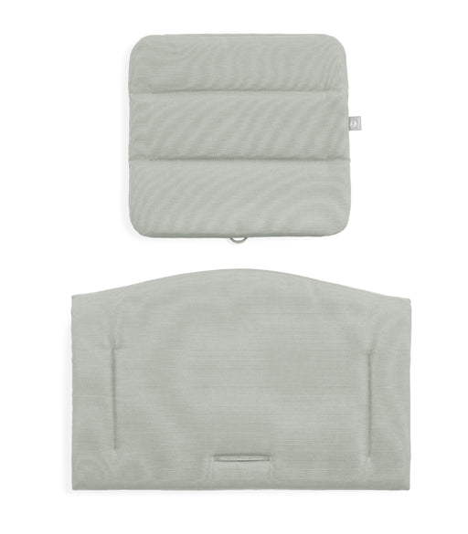 Two light gray textured pillows on a white background