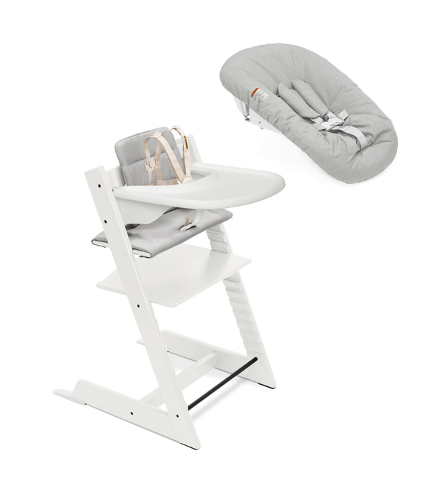 White high chair with gray cushion and matching headrest on a white background