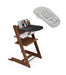 Wooden high chair with accessories on a white background