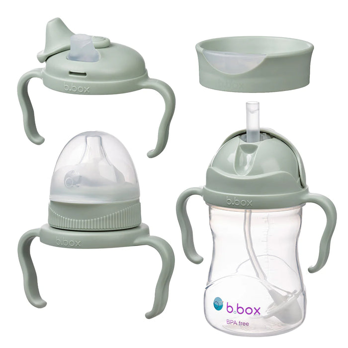 Set of baby feeding products including a bottle, sippy cup, and trainer cup with handles on a white background.