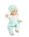 Baby doll wearing a mint green outfit with a matching headband on a white background