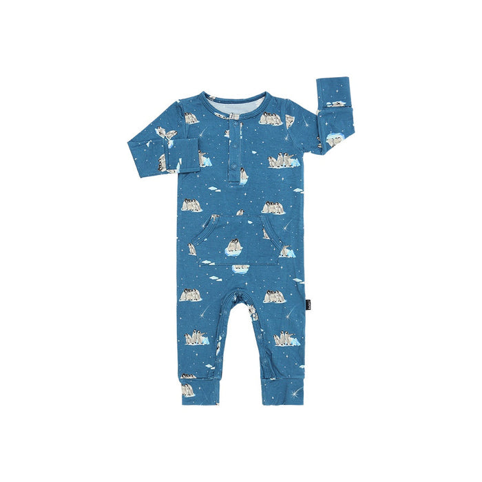 Blue baby onesie with penguin pattern on a white background