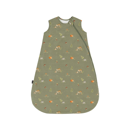 A sleeveless baby sleep sack in sage green with a repeating woodland print of foxes, mushrooms, and pine trees, shown flat against a white background.