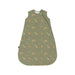 A sleeveless baby sleep sack in sage green with a repeating woodland print of foxes, mushrooms, and pine trees, shown flat against a white background.