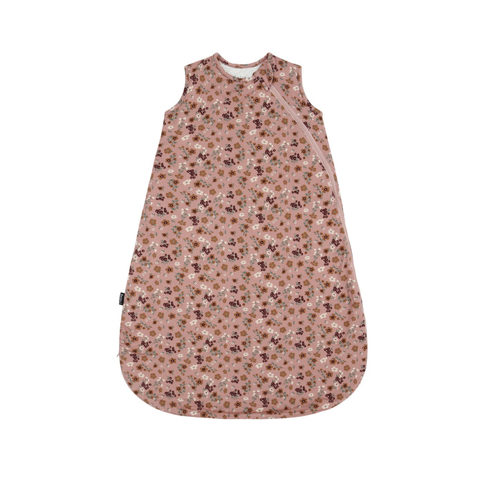 A sleeveless baby sleep sack with an all-over small floral print in dusty pink, brown, and white, shown flat against a solid white background.