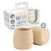 Beige training cups with packaging labeled 'BIBADO' on a white background