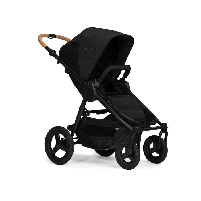 Black stroller with cork handlebar on a white background