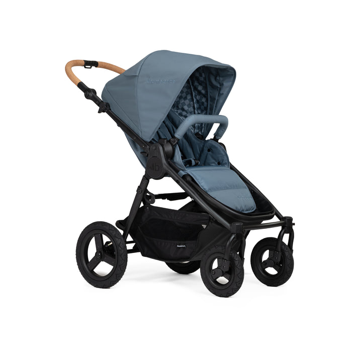 Blue stroller with black frame and cork handlebar on a white background