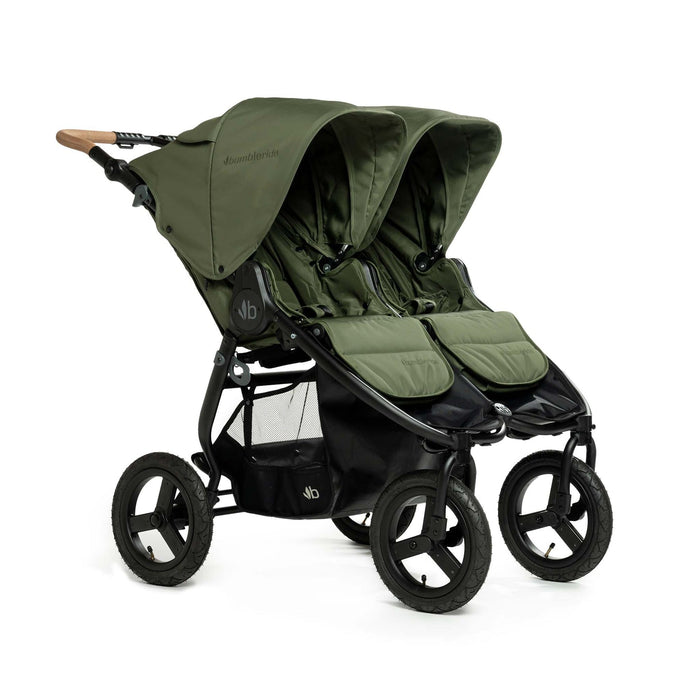 Green double stroller on a white background