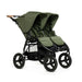 Green double stroller on a white background