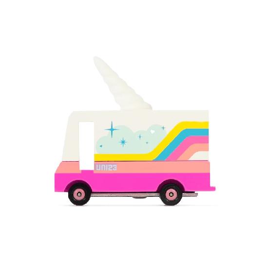 A colorful wooden toy van with a unicorn design on top, predominantly pink in color, with white, yellow, and rainbow accents.