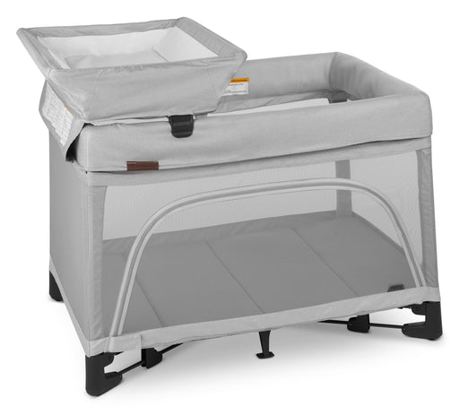uppababy remi playard shown with changing station accessory attached