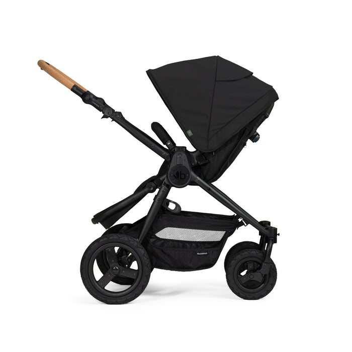 Black stroller with cork handle on a white background