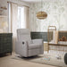 Nelly Rocker Glider in nursery with manually reclining footrest