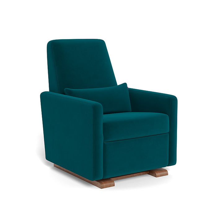 Teal armchair with wooden base on a white background