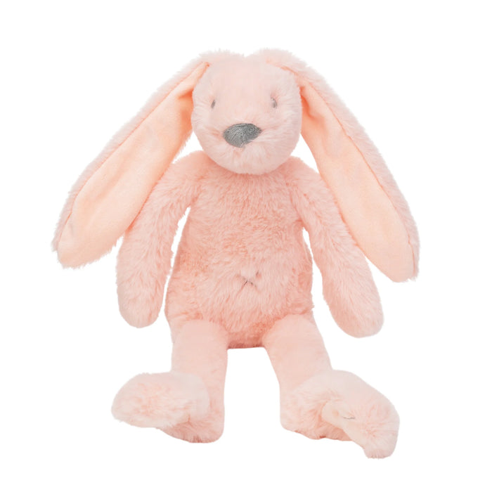 Pink plush bunny toy on a white background