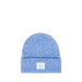 A light blue heathered knit beanie hat with a folded cuff and a white rectangular Herschel logo patch on the front, photographed against a solid white background.