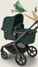 All New Fern Green Bugaboo stroller on a light beige background