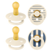 Set of four baby pacifiers with striped and plain designs on a white background