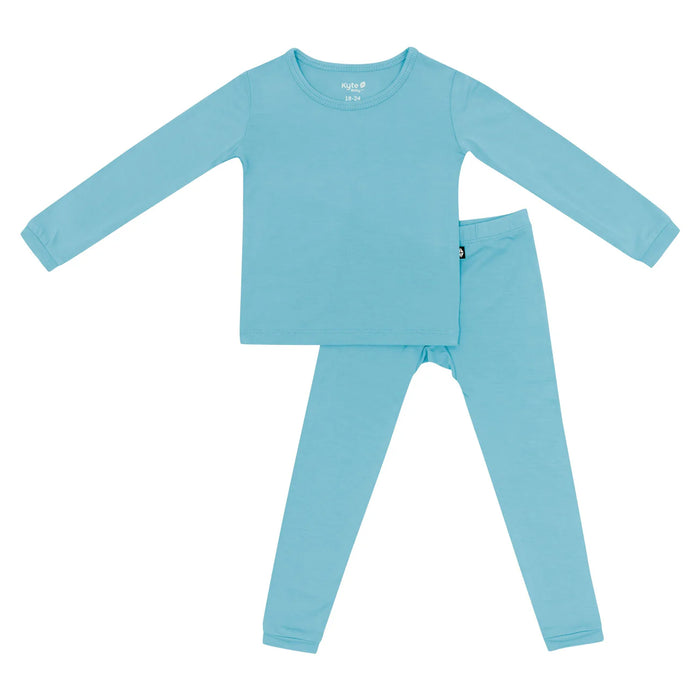Light blue Kyte pajama set on a white background