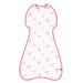 Baby sleeping bag with pink bow pattern on a white background