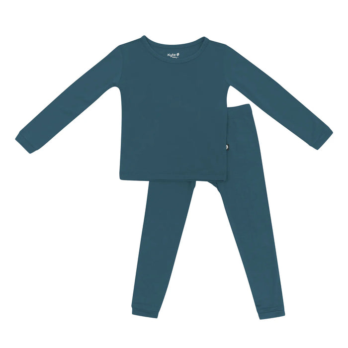 Blue children's pajama set on a white background