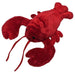Red plush lobster toy on a white background