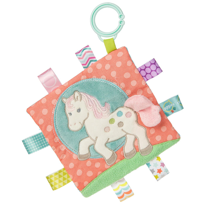 Pink Pony Crinkle Me with folded ribbon tags on a white background