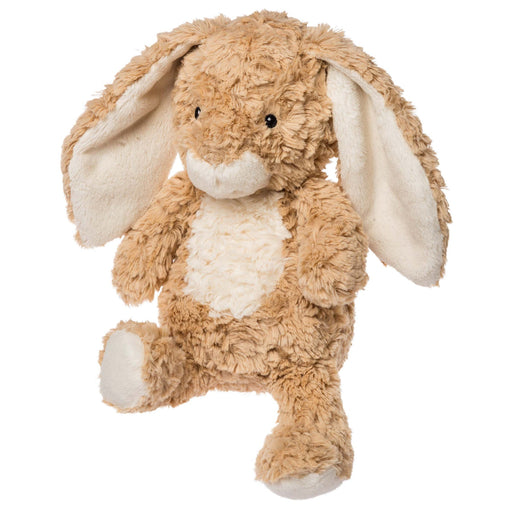Plush toy rabbit with beige and white fur on a white background