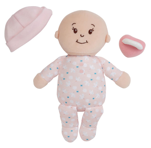 Baby doll with pink outfit, hat, and pacifier on a white background